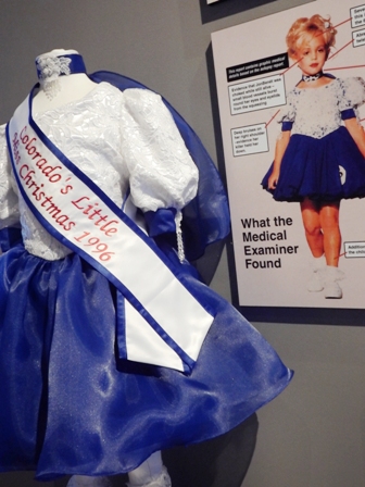 At Beyond the Lens Jon Benet Ramsey's trophies, personal drawings, and a pageant dress are all on display.