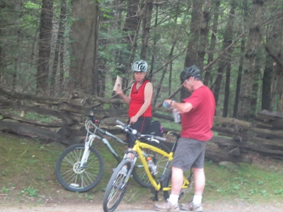 couple bike riding in cades-cove