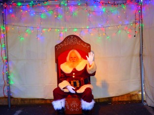 This Gatlinburg Chili Cook-Off Santa is wishing you a 
